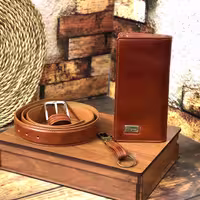 ست کادوئی کیف و کمربند چرم طبیعی فراگامو