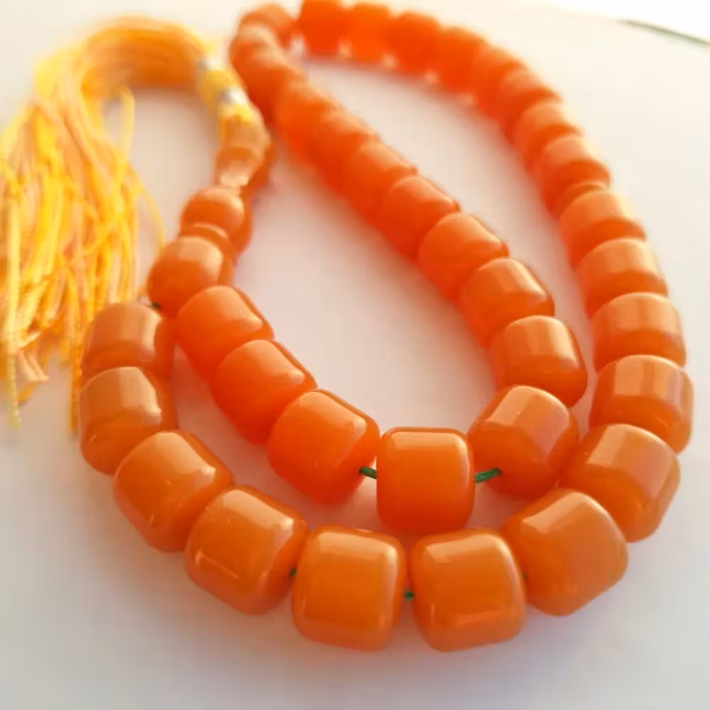 تسبیح سندلوس 35 دانه کد 1005 بودار تراش برمیلی یا استوانه‌ای آقابزرگ