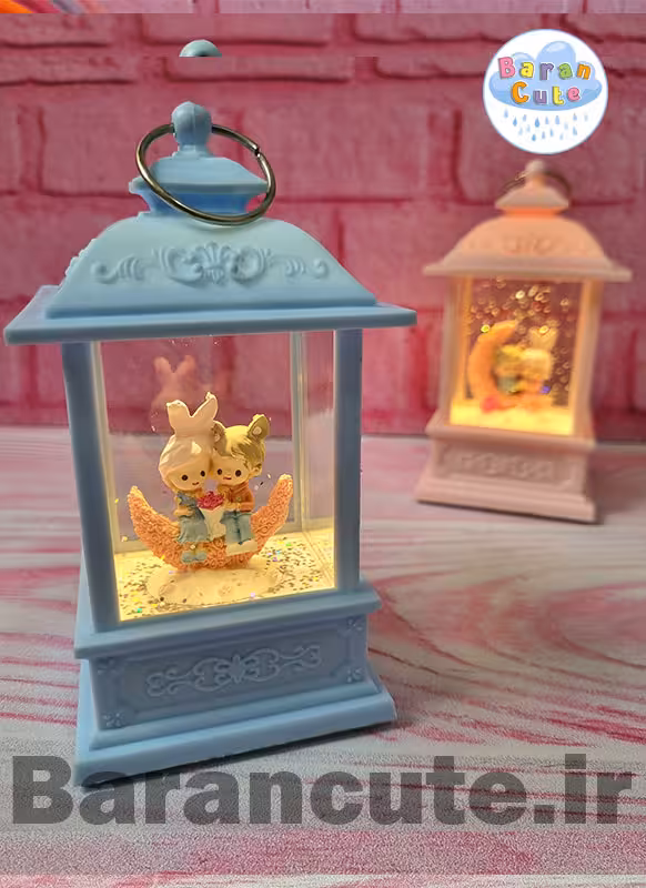 فانوس موزیکال چراغ دار طرح عاشقانه روی ماه آبی