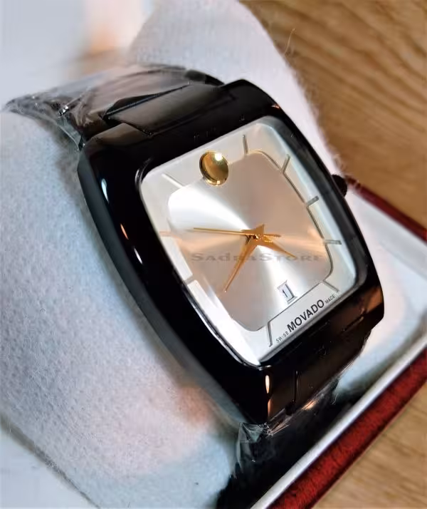 MOVADO WATCH 2193 موتور ژاپن موادو موتور SLLO ژاپن *** فلزی مشکی باصفحه صدفی براق ** شیشه شفاف با طراحی بسیارزیبا