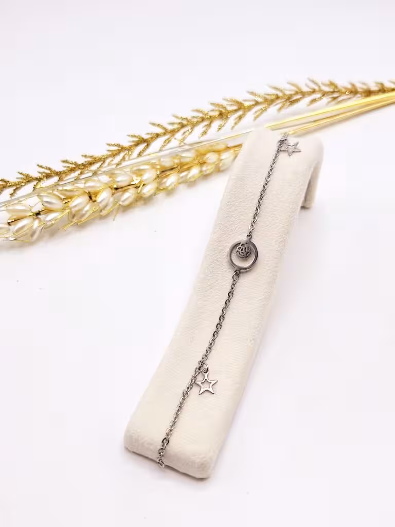 دستبند زنجیری طرح گلبرگ و ستاره استیل