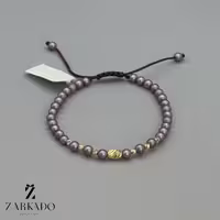 دستبند مرواریدی و گوی البرنادو طلا با مروارید مات