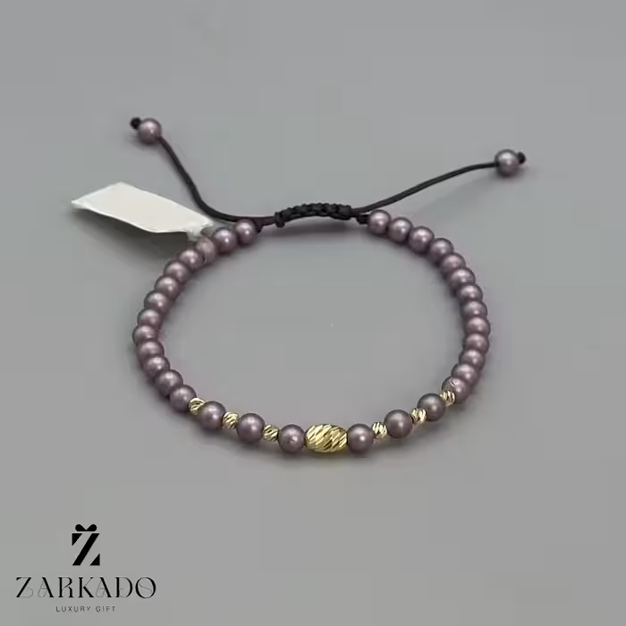 دستبند مرواریدی و گوی البرنادو طلا با مروارید مات