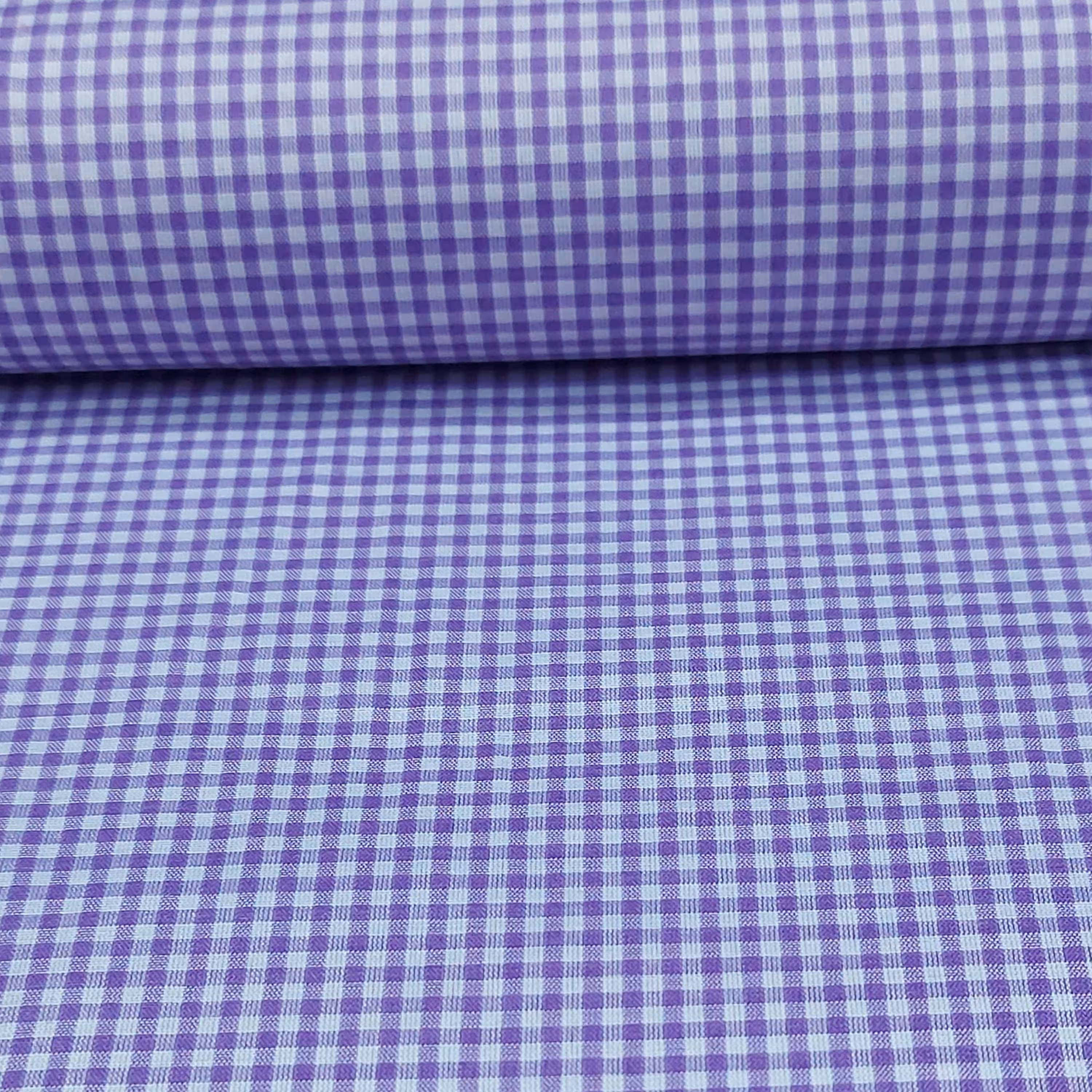 پارچه تترون چهارخانه ریز  بنفش ملحفه سرای رزاق 