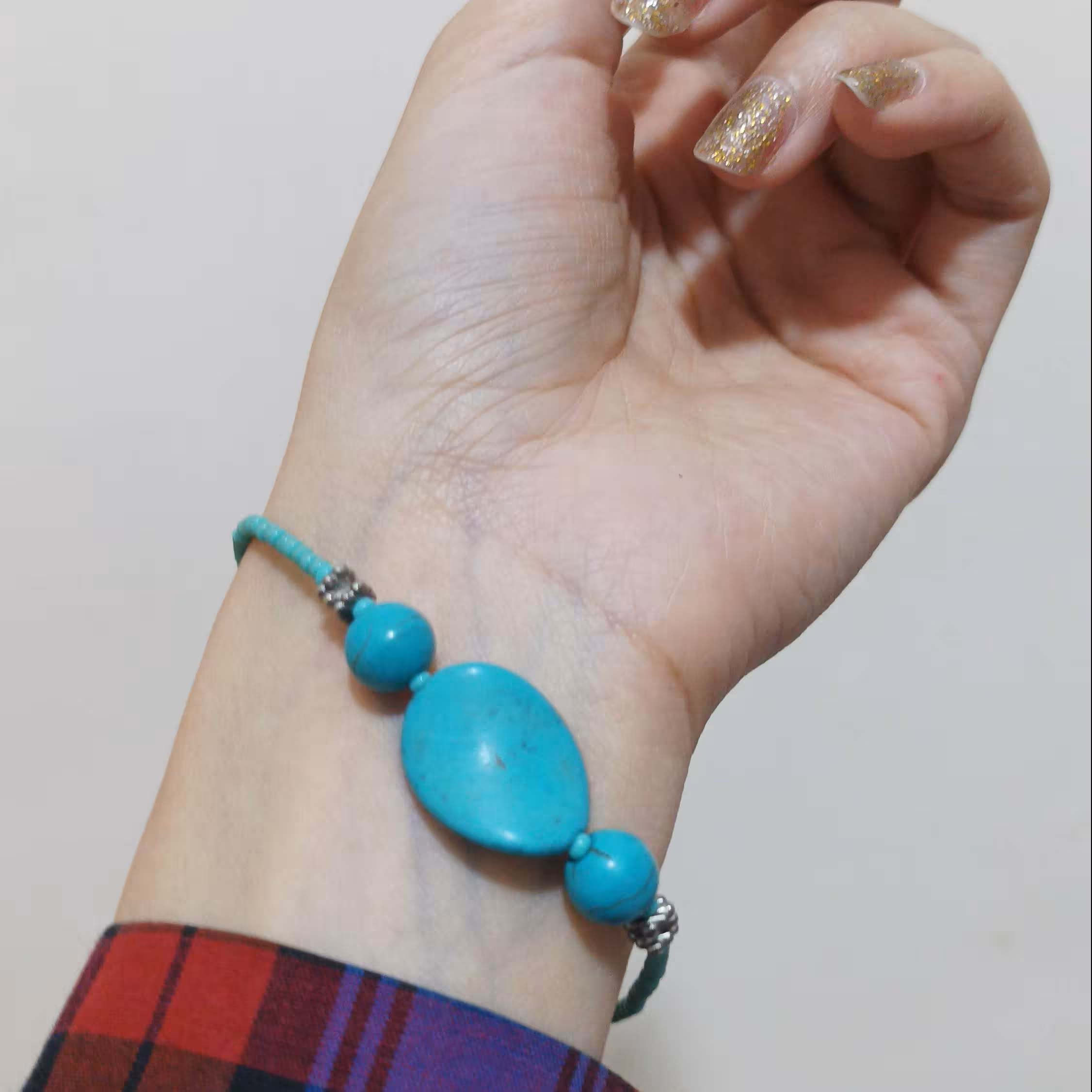 دستبند زیبا با رنگ فیروزه ای