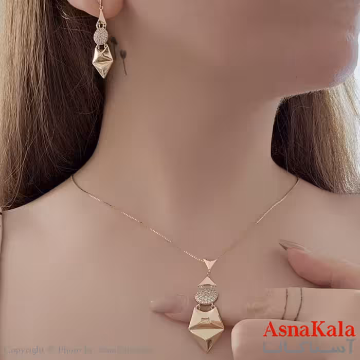 نیم ست زنانه ژوپینگ شامل گوشواره و گردنبند طرح طلا کد NIM14546W