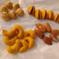 آجیل 4 مغز  بوداده فوق اعلا  تازه وخوشمزه پسته  اکبری درشت دستچین براحتی پسته از پوست جدا میشه مغزهای درجه یک خیلی عالی 