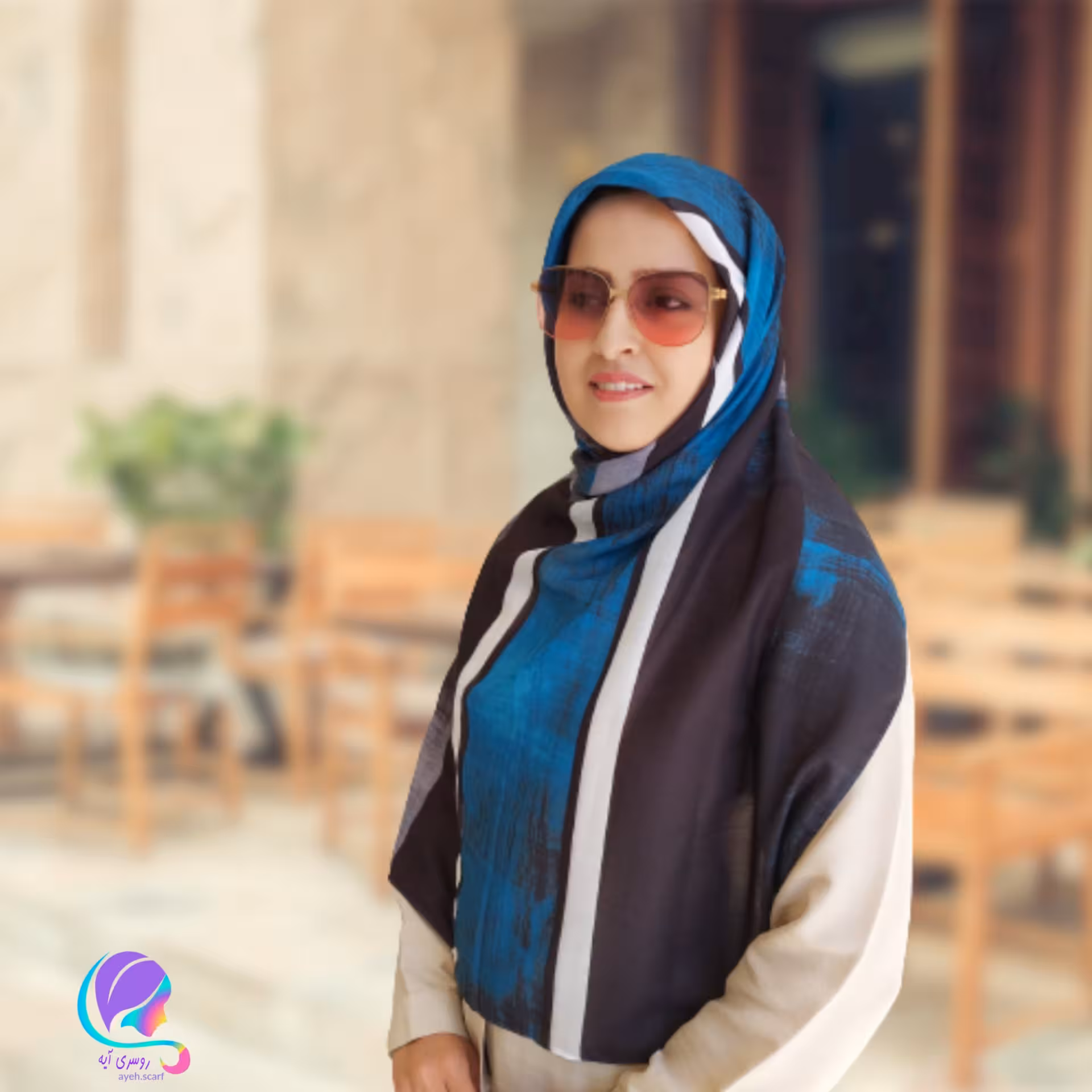 شال راه راه آبی منگوله دار 