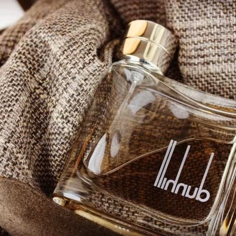 عطر ادکلن دانهیل قهوه ای (100میل ) ماندگاری تا48 ساعت تضمینی برند لوزی سوییس