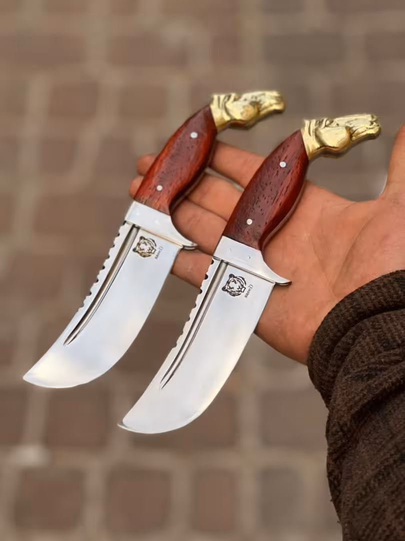 کارد شکاری کلکسیونی دسته پادوک  طول کار 25 سانت  یک تیکه تیغه فولادی
