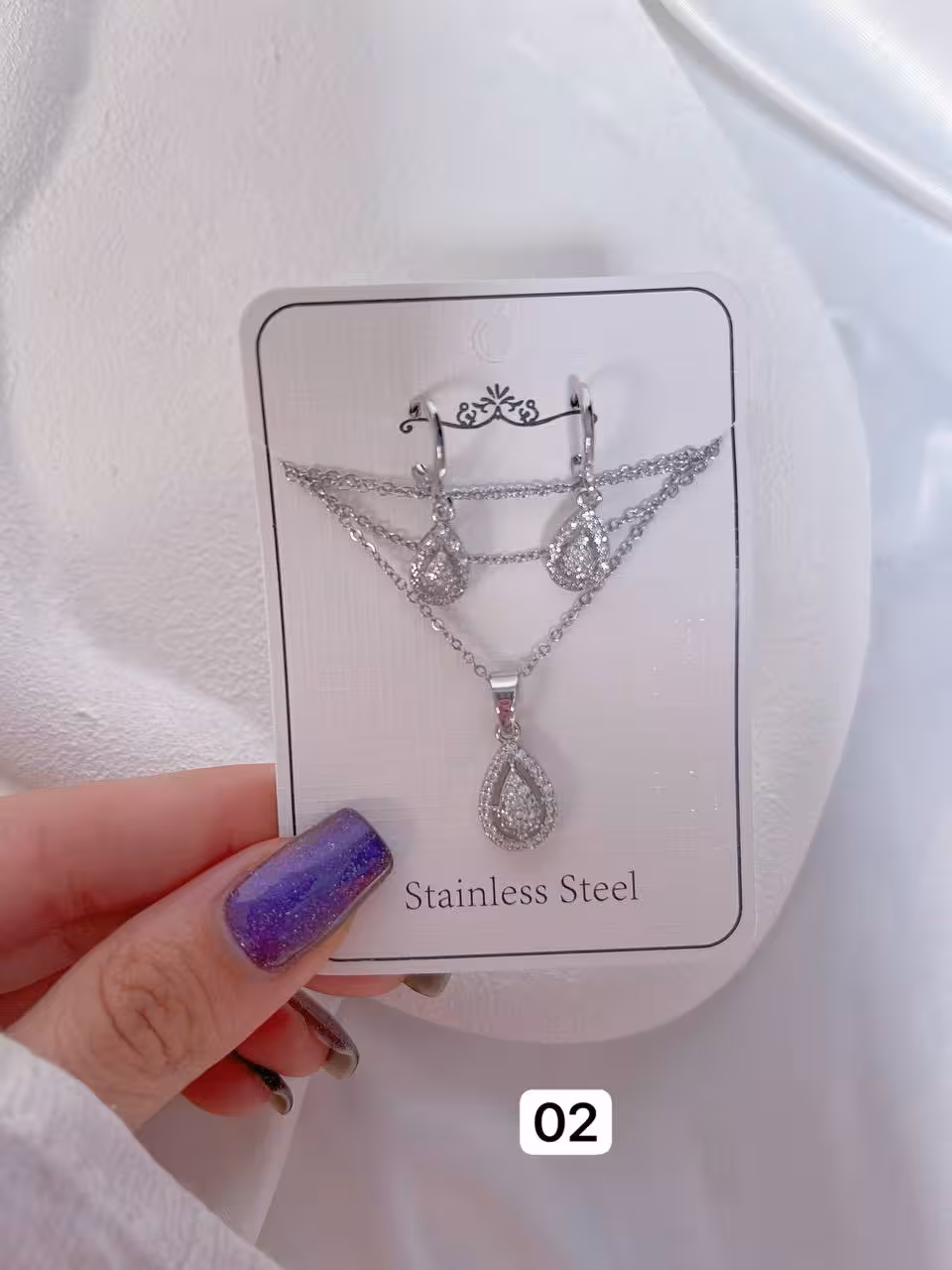 کالکشن نیمست مجلسی770 نیمست مجلسی/شامل گوشواره حلقه ای گردنبند/زنجیر استیل و‌رنگ ثابت/پلاک ابکاری/ضدحساسیت/نگین مخراج کاری شده/هرگونه بدلیجات از موادشوینده عطرادکلن استخر دورباشند