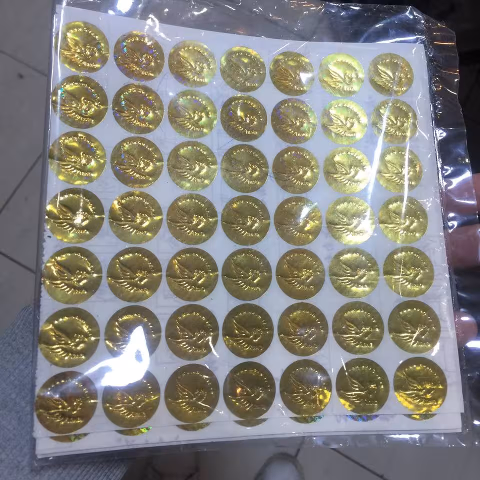 500 عدد هولوگرام اختصاصی درجه یک - طراحی رایگان - زمینه نقره ای طلایی
