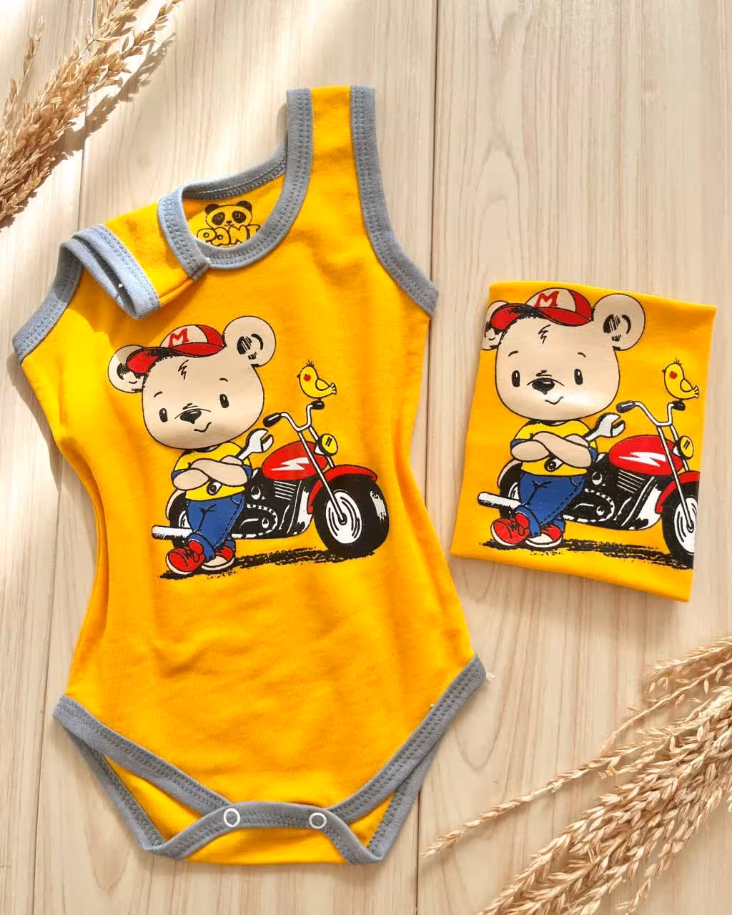 لباس بچه گانه رکابی زیر دکمه موش موتوری