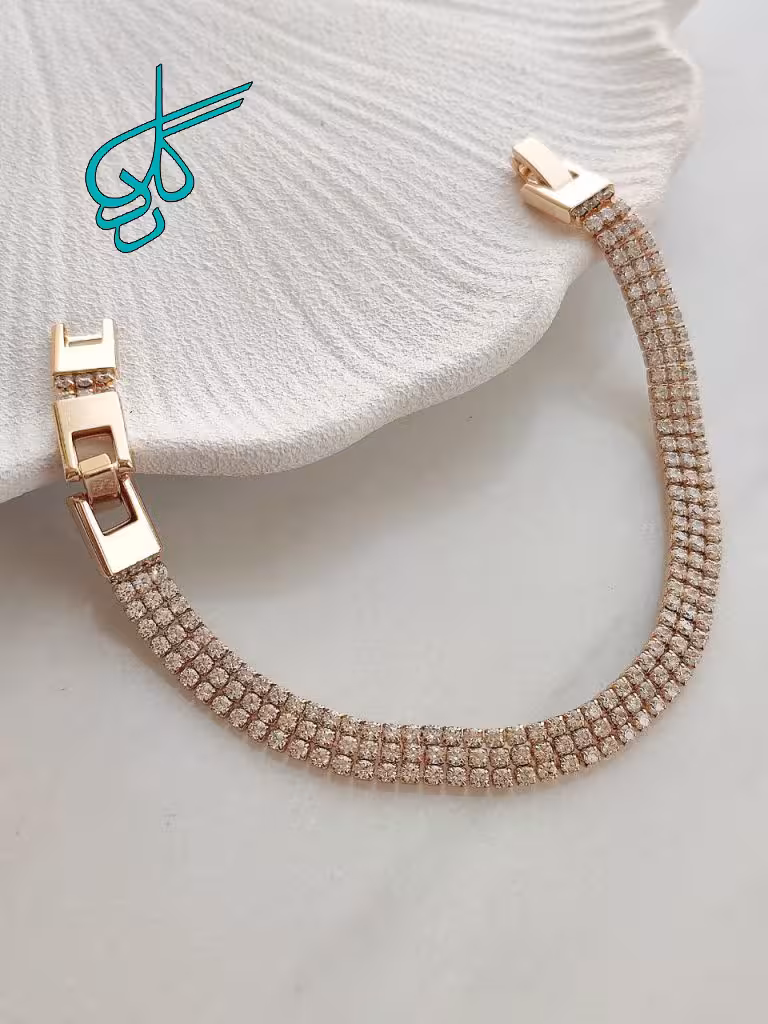 خرید دستبند مارک ژوپینگ نگیندار سه ردیفه طول 19 میلیمتر پهنای 6 میلیمتر کیفیت عالی رنگ ثابت کد 1216907 - ردگل