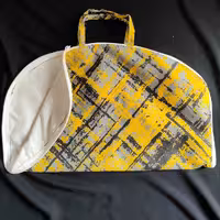 جانانی پارچه ایی 3 لایه با رویه پارچه طرح خط دار توسی زرد مشکی  لایه میانی سفره و داخل متقال سفید 