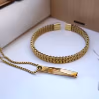 ست بنگل و گردنبند طلایی پسرانه استیل