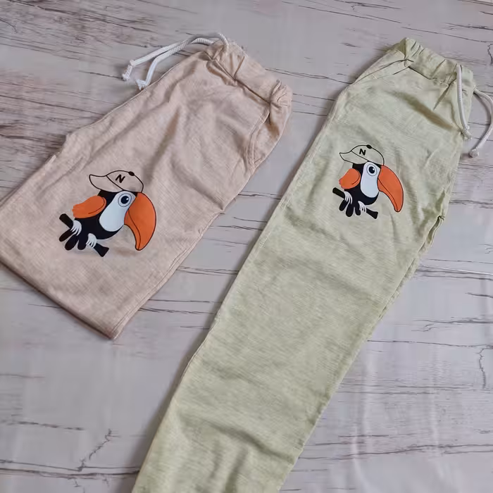 شلوار دم پا کت اسپورت نوجوانه طرح کلاغ(فری سایز تا 44)