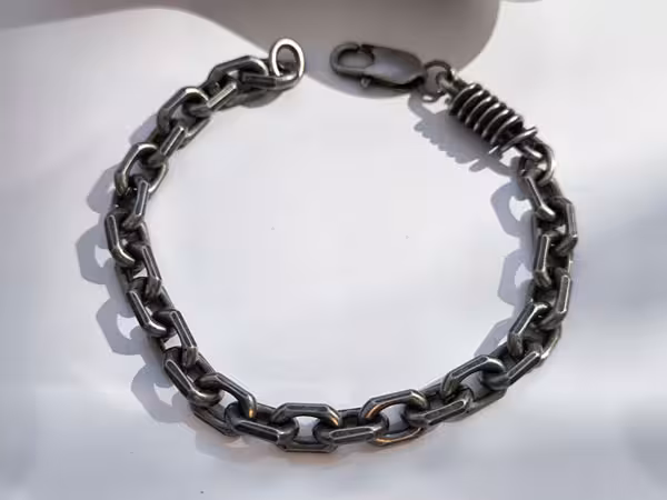 دستبند زنجیری گنگ سیاه قلم استیل