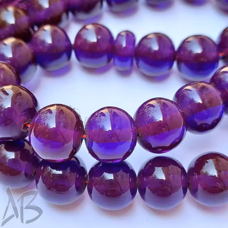 تسبیح سندلوس 33 دانه بودار تراش گرد دوپوست آبی و بادمجونی زیبا کد 811 آقابزرگ