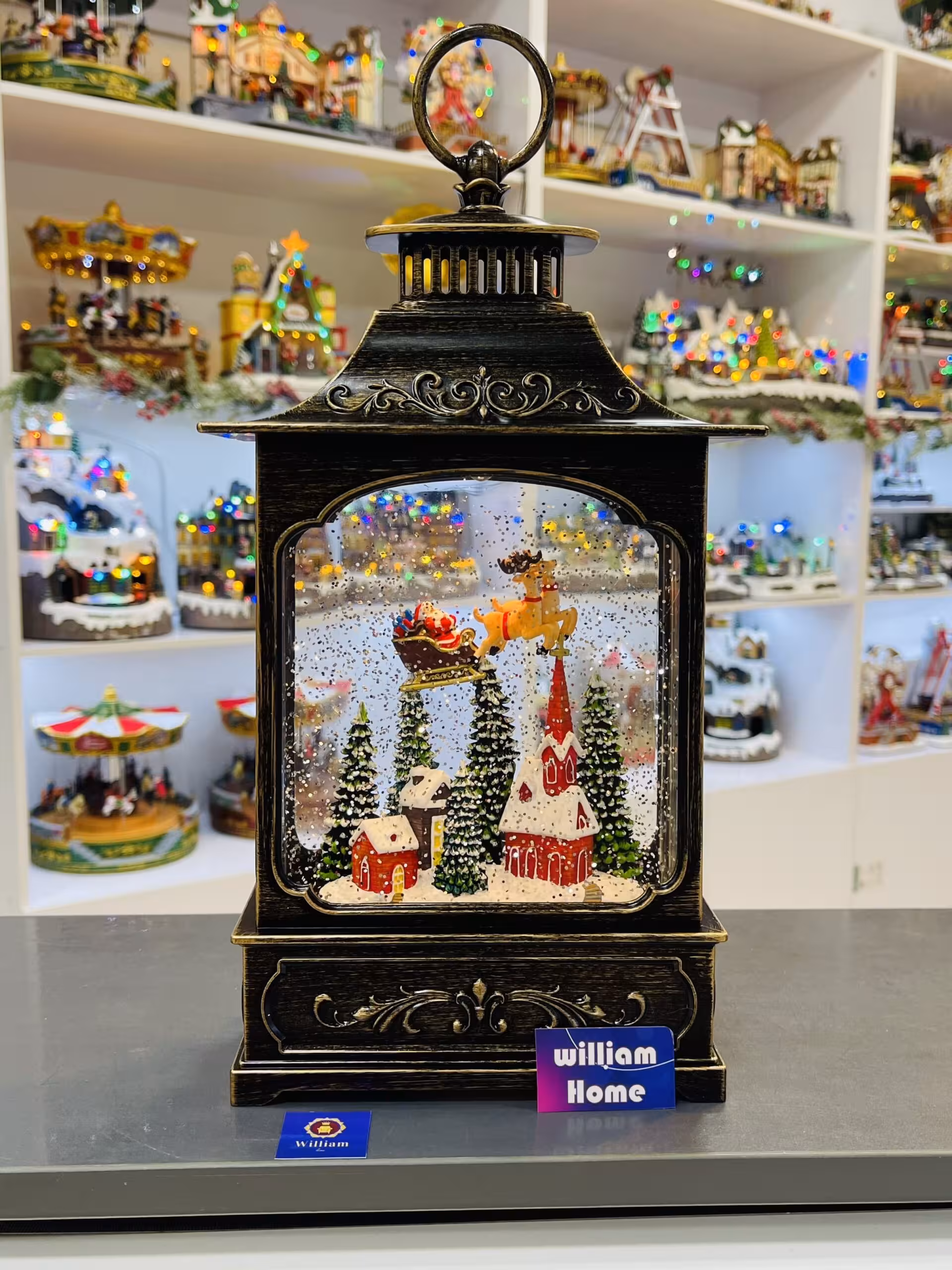 فانوس موزیکال گوزن ها و سورتمه بابانوئل کریسمس