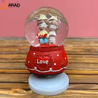 گوی موزیکال متوسط طرح دختر و پسر قرمز و لاو