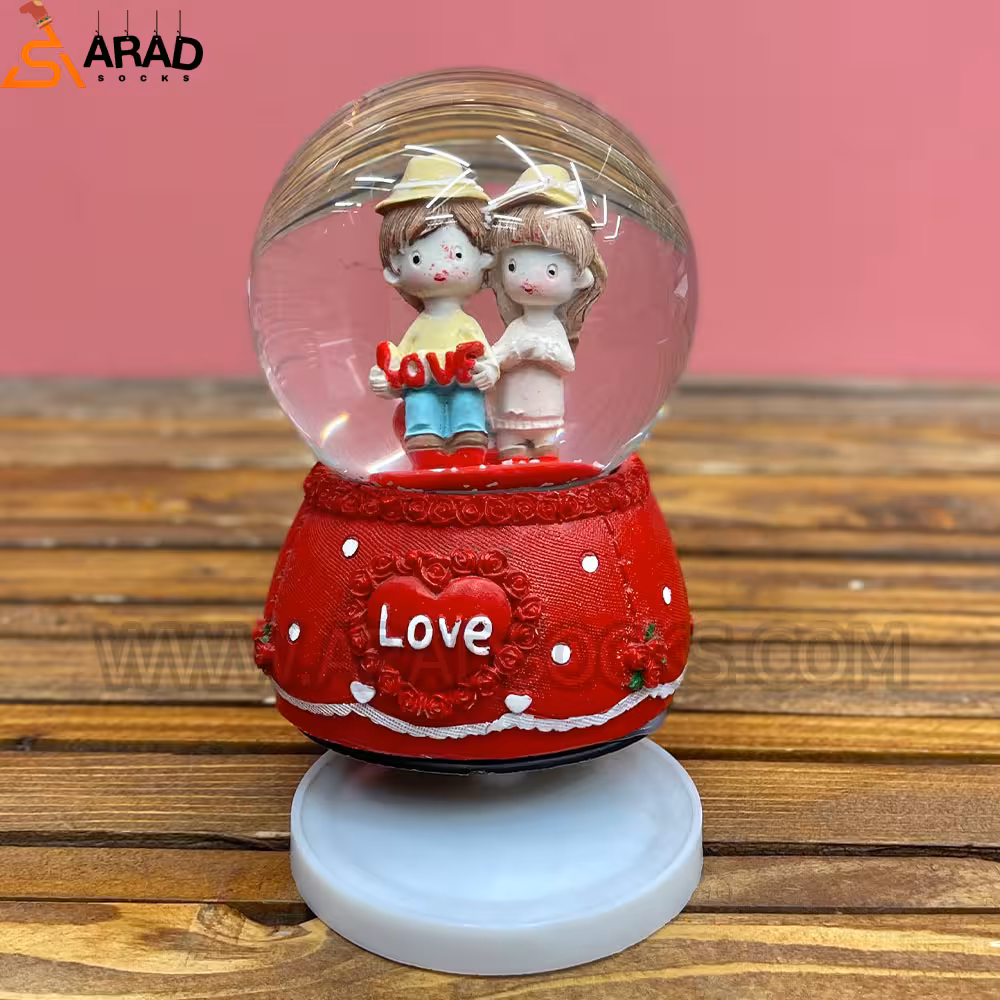 گوی موزیکال متوسط طرح دختر و پسر قرمز و لاو