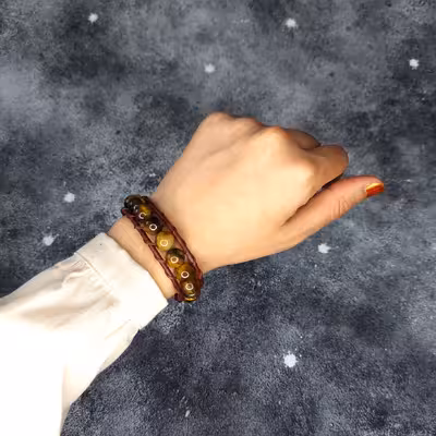 دستبند مدل سنگ چشم ببر دکمه ای 70