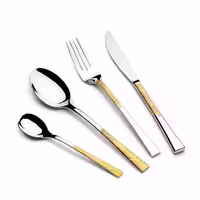 سرویس قاشق و چنگال 86 پارچه عرشیا مدل طلایی و نقره‌ای مدل TM762GS-3043