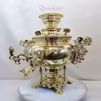 سماور برنجی زغالی 6 لیتری مدل عدسی دسته ملکه کنده کاری سنتی خاص و انحصاری