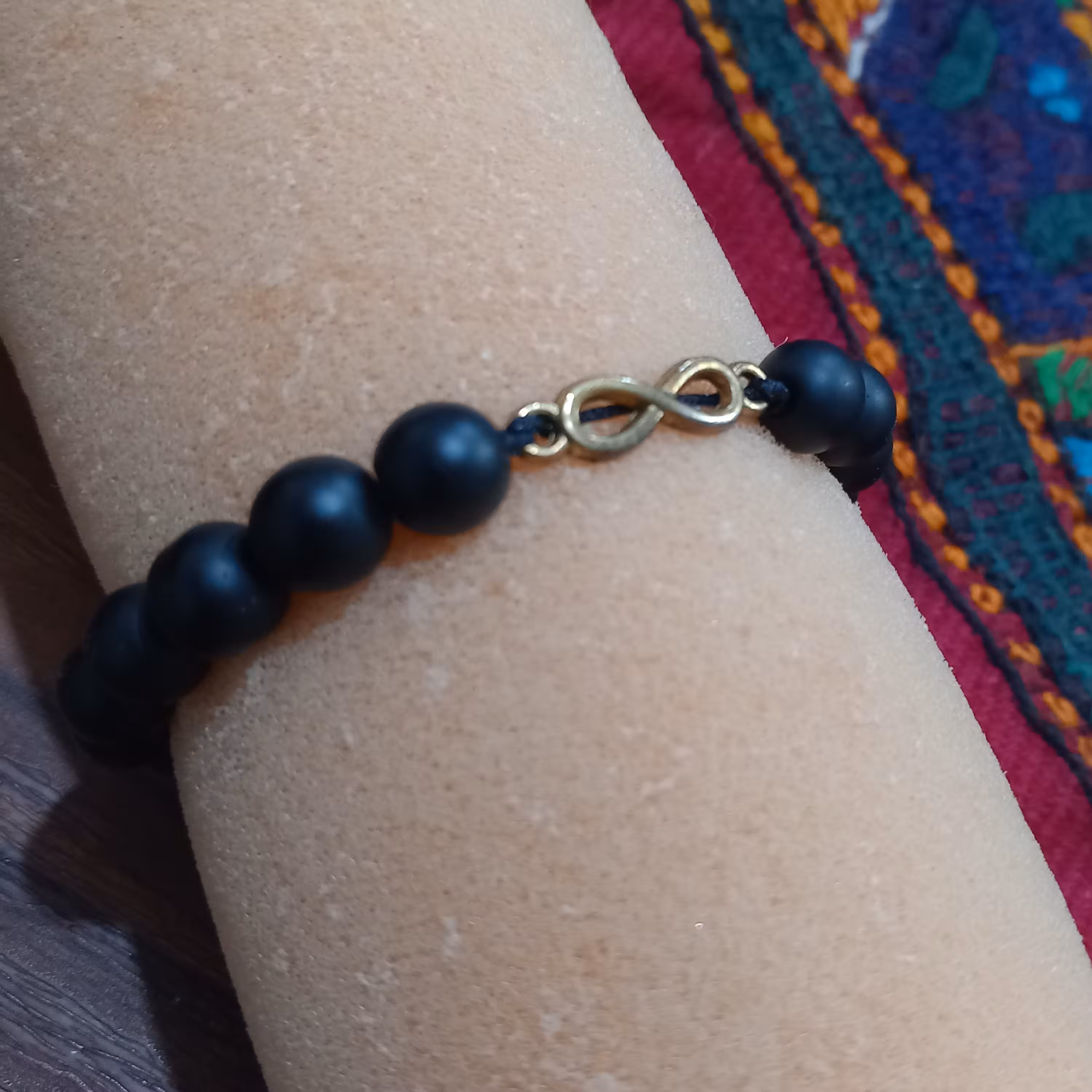 دستبند اونیکس اصل مشکی طرح بی نهایت 