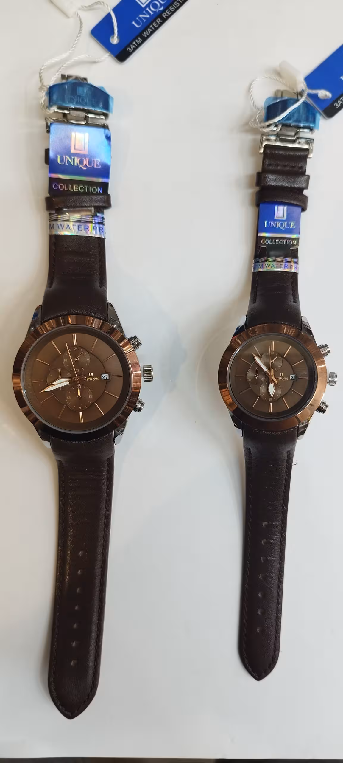 ساعت مچی ست یونیک فقل پروانه‌ی طرح سه موتور UNIQUE رنگ قهوه ای کد 6131G