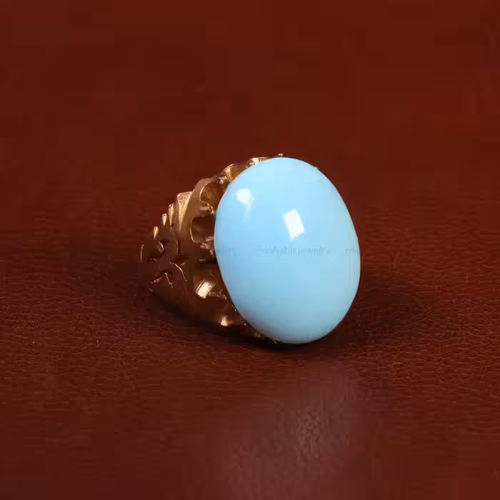 نگین فیروزه عجمی کد 29845 - جواهری مشاهیر