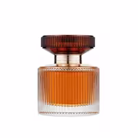 عطر زنانه ملایم و خوشبو آمبر الکسیر با رایحه گرم