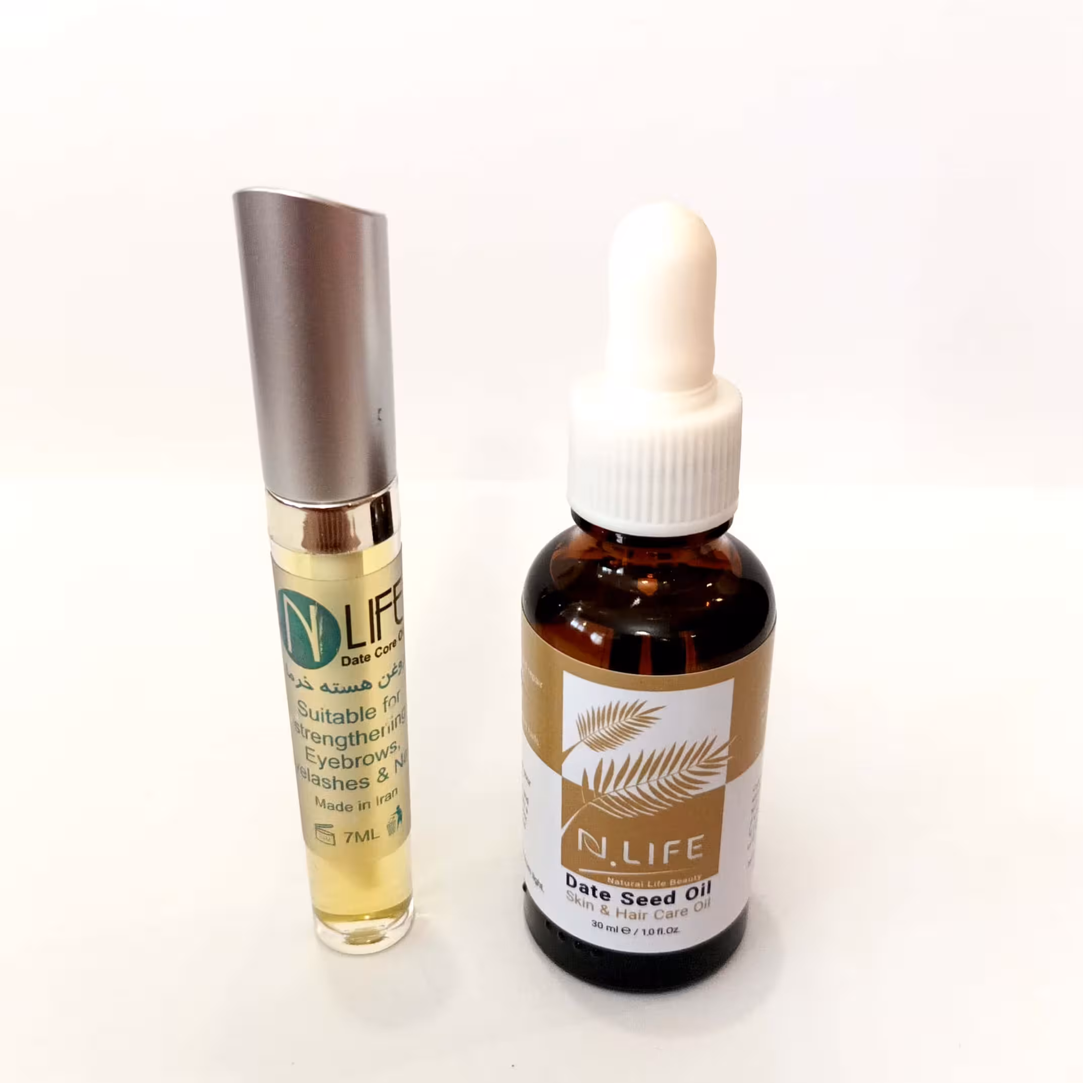 پکیج دوتایی روغن هسته خرما- یک بسته 30سی سی و یک بسته 10سی سی
