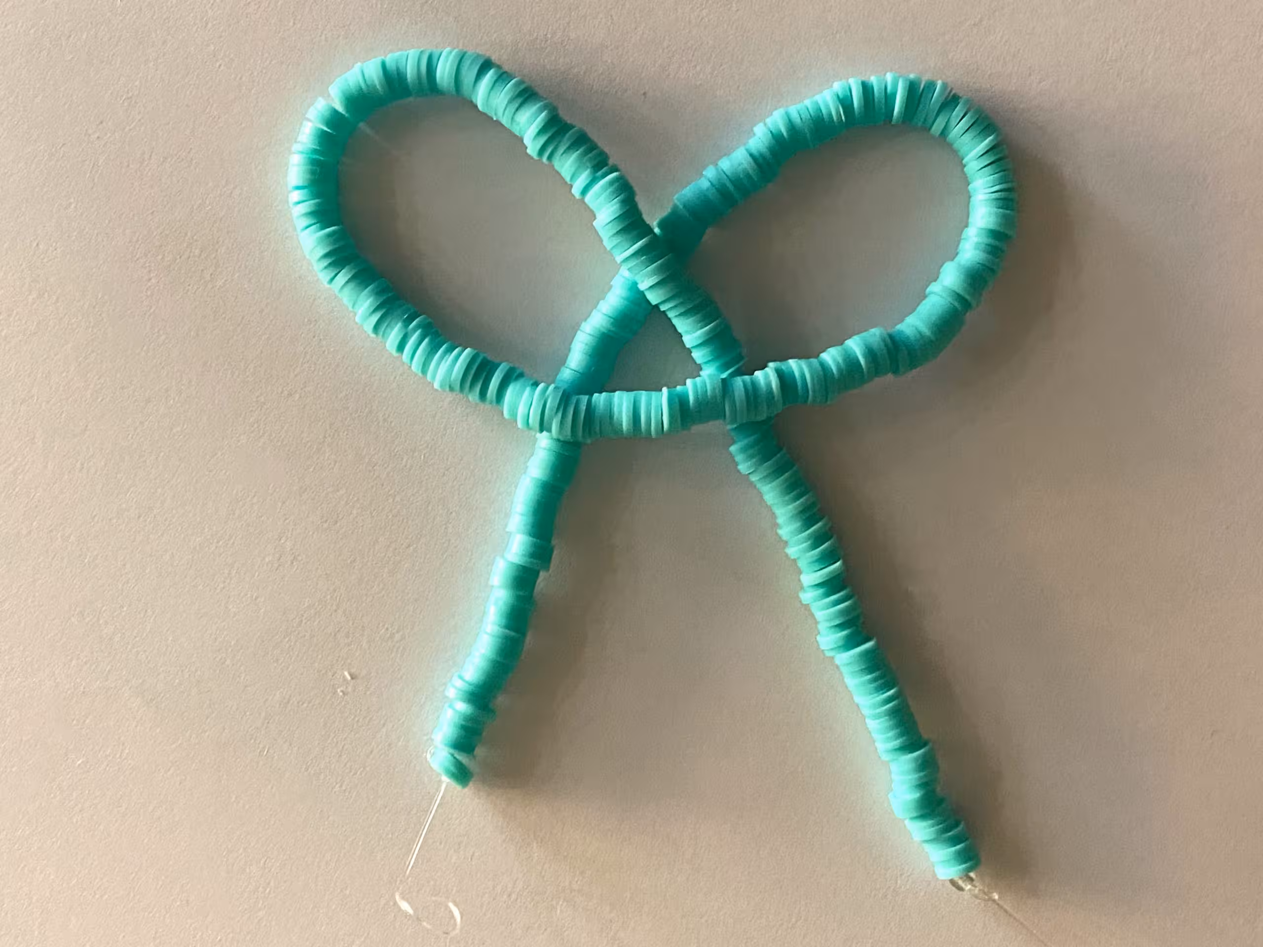 مهره فیمو واشری تک رنگ آبی فیروزه‌ای سایز 6 میلی متر