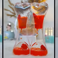 ساعت شنی (روغنی)  طرح قلب های دوقلو کد T 24