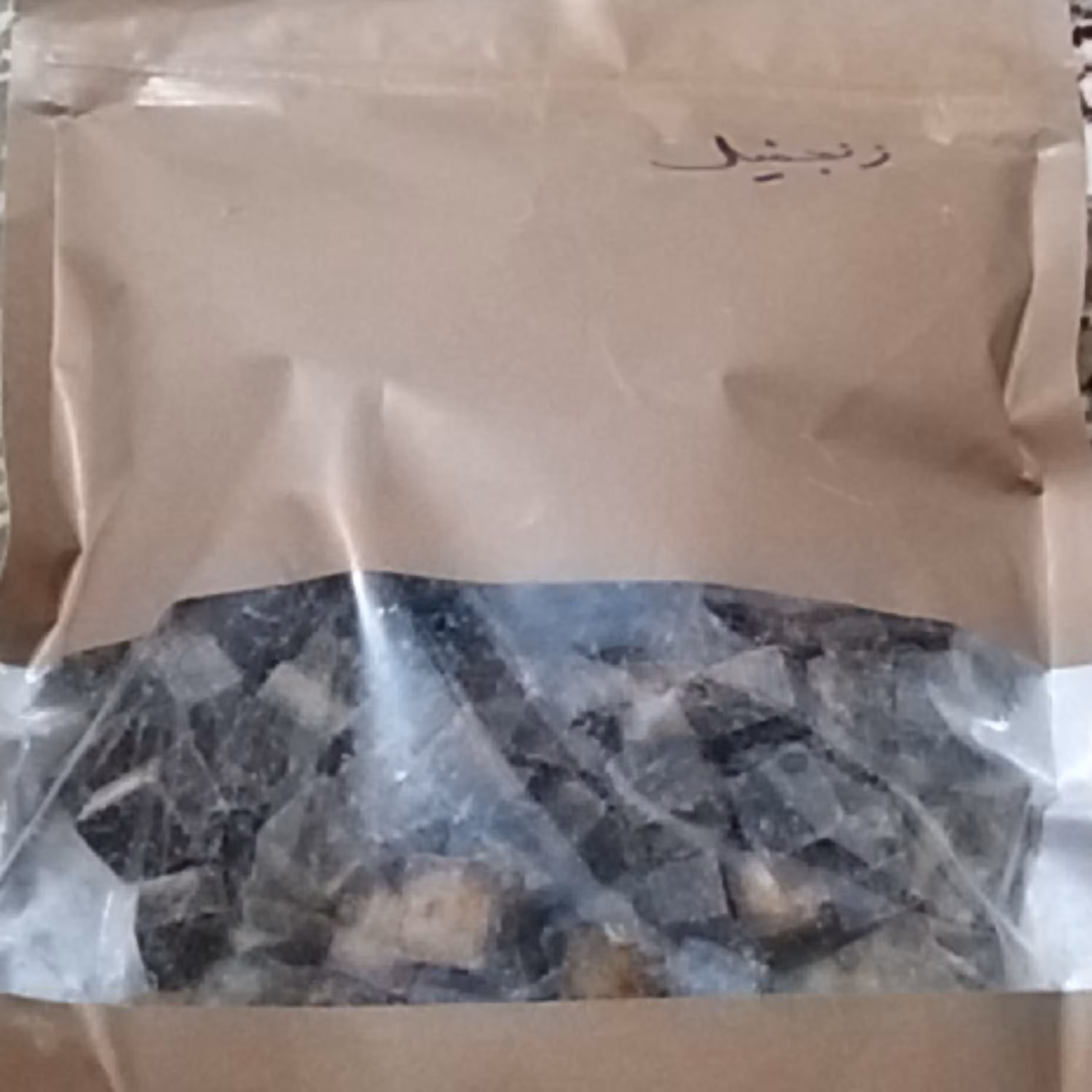 قند قهوه ای باطعم زنجبیل در بسته 1کیلویی، در بسته بندی مناسب