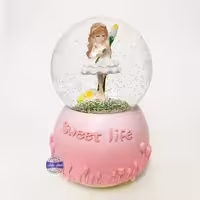 گوی چراغدار موزیکال پمپی برفی دختر زیبا با گل