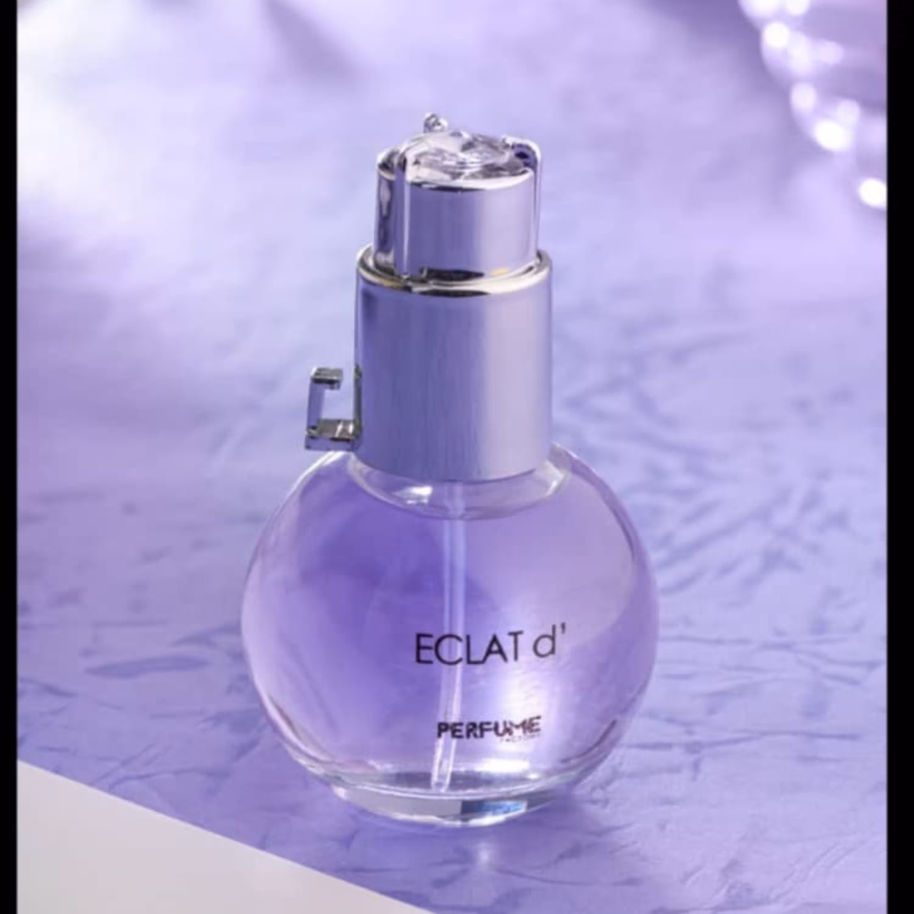 عطر جیبی زنانه ایکس اند ال پرفیوم فکتوری مدل اکلت  ECLAT حجم 30 میل 