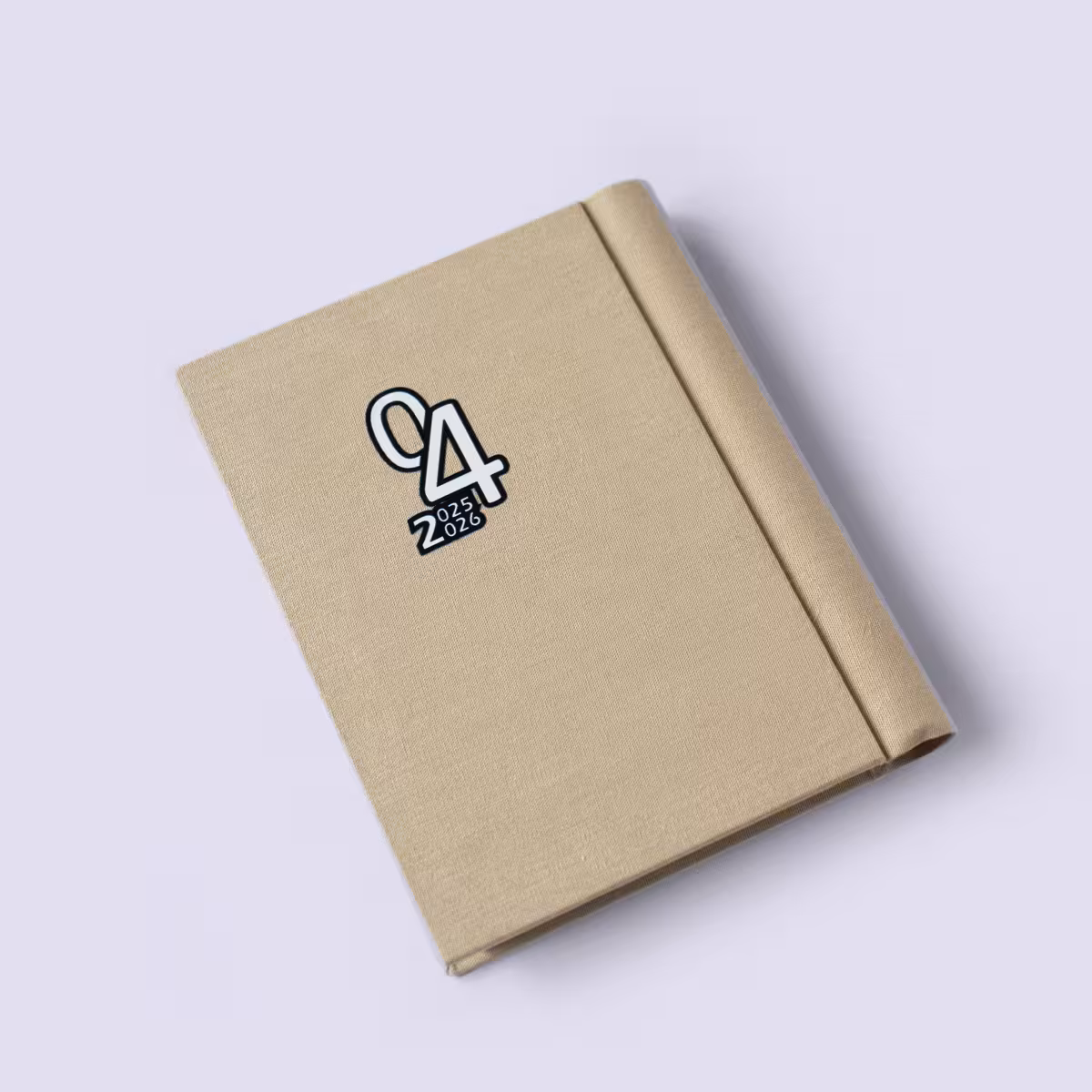 سررسید 1404 نیم وزیری پارچهای سیمی کرمی دات (DAT)