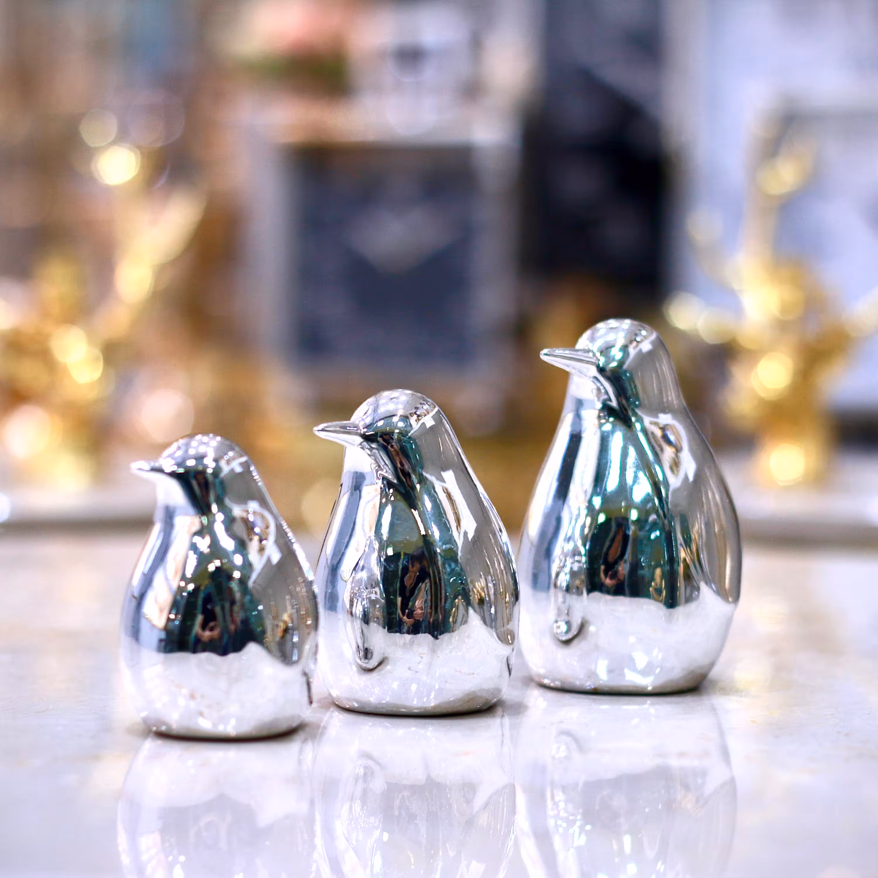 اکسسوری مجسمه پنگوئن سه سایز سرامیکی طلایی و نقره ای