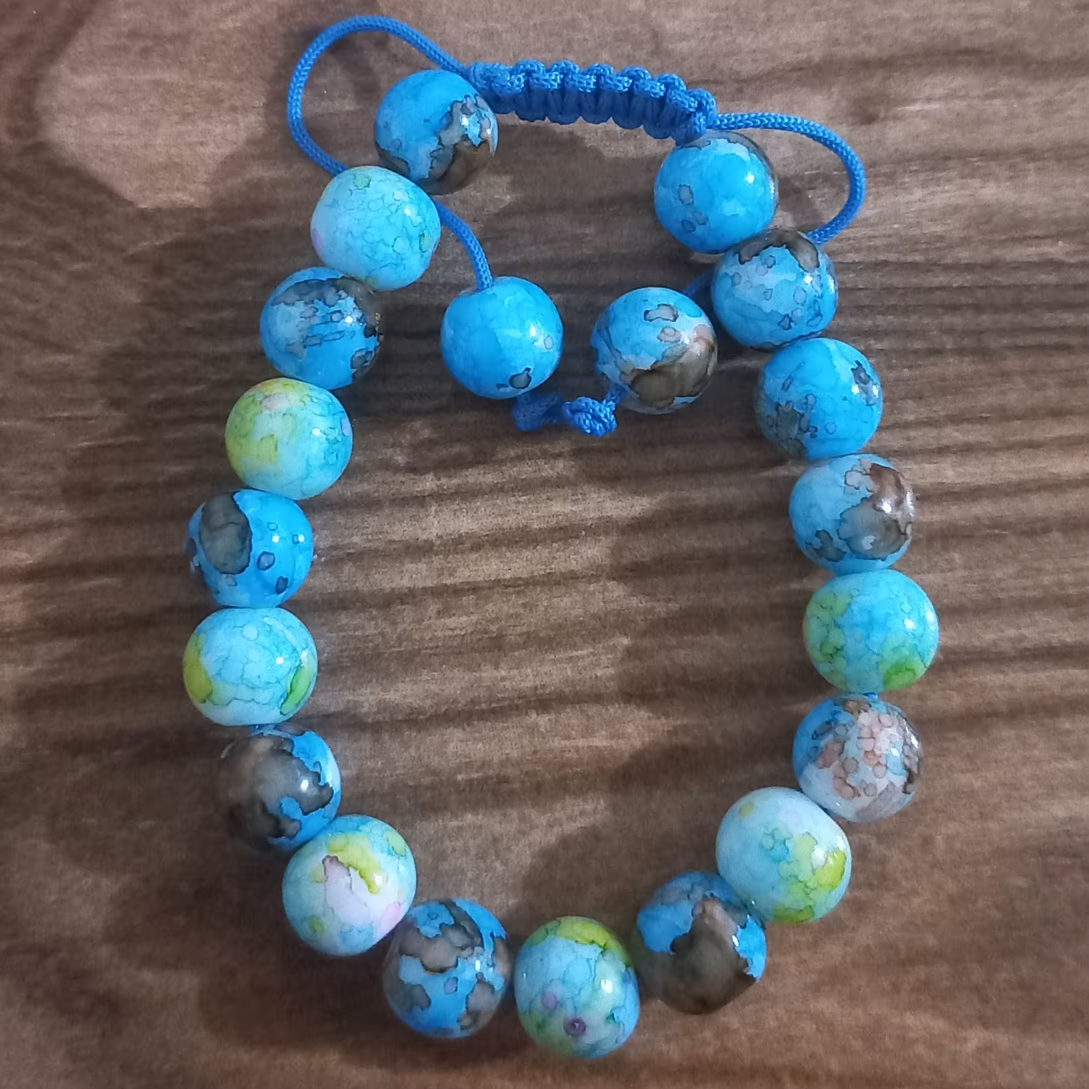 دستبند آبی آبرنگی، بافت کشویی