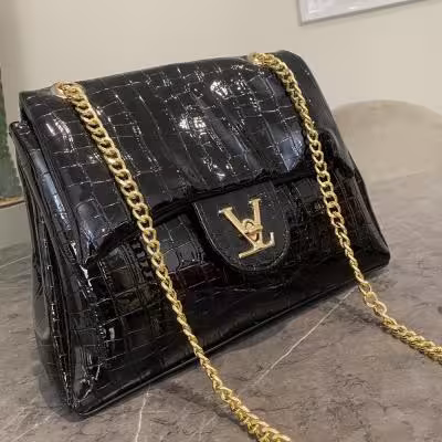 کیف مجلسی زنانه مشکی ورنی