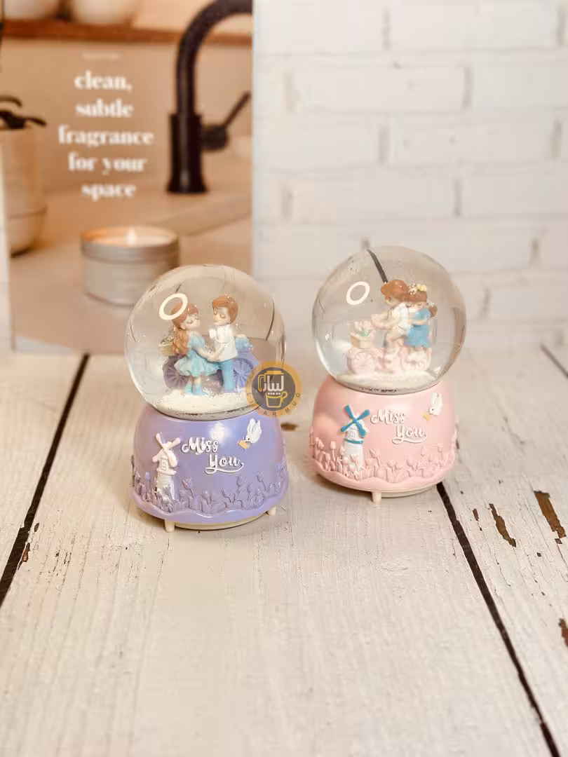 گوی موزیکال پمپی چراغدار بزرگ طرح دختر پسر دوچرخه گلدار کد 6837