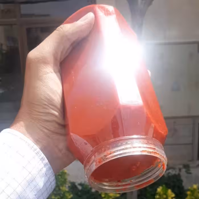 رب گوجه خانگی ریحان (تهیه شده با گوجه کاملا سالم و نمک طبیعی و یک لایه روغن زیر درب)