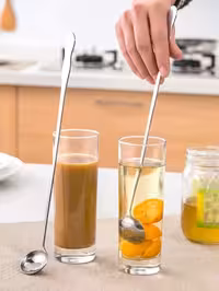 ملاقه و قاشق همزن پارچ استیل طلایی