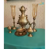 سرویس سماور برنجی زغالی شش لیتری مدل خطی دسته خواب