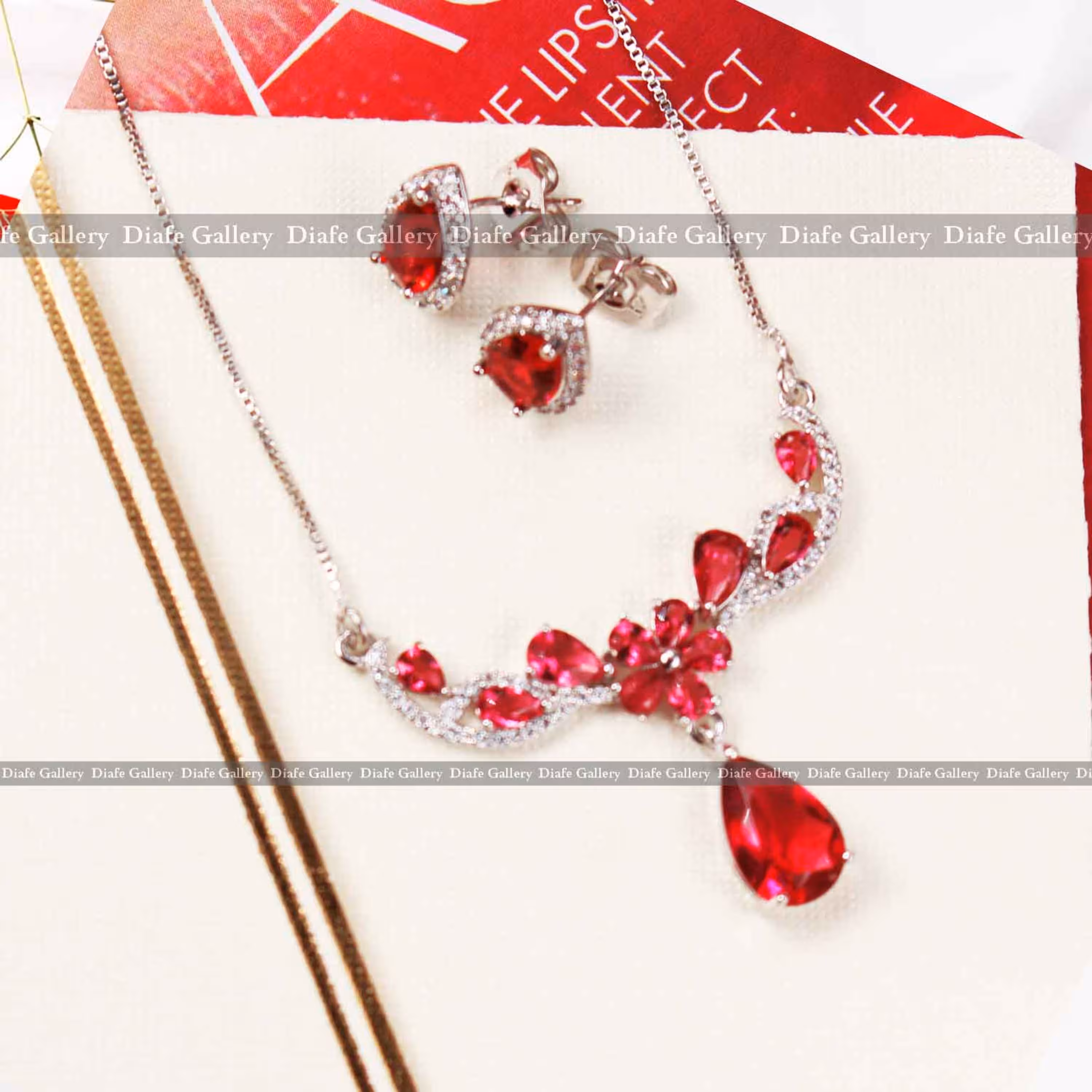 نیم ست ژوپینگ اشکی اناری ظریف طرح طلا سفید جنس استیل رنگ ثابت زنانه ودخترانه 