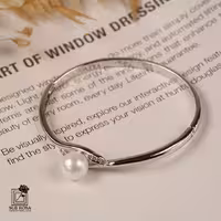 دستبند النگویی سواروسکی المنتس طرح مروارید 12456