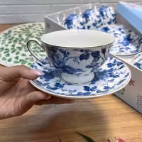 ست چایخوری 12 پارچه گل‌دار کد 6107 | فنجان و نعلبکی چینی طرح رز آبی